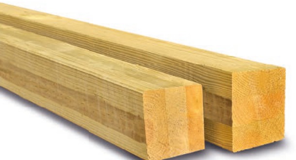 Poutres en bois lamellé-collé, matière utilisée pour les kits pergola haut de gamme.